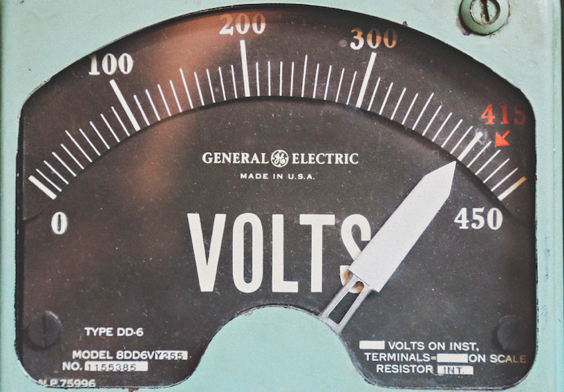 the power of feeling worthy: General Motors electric box showing high voltage