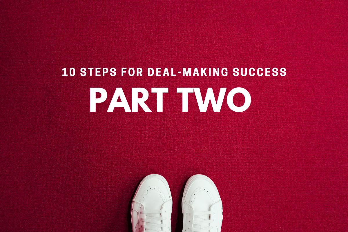 Deal-Making Success: white shoes on red carpet