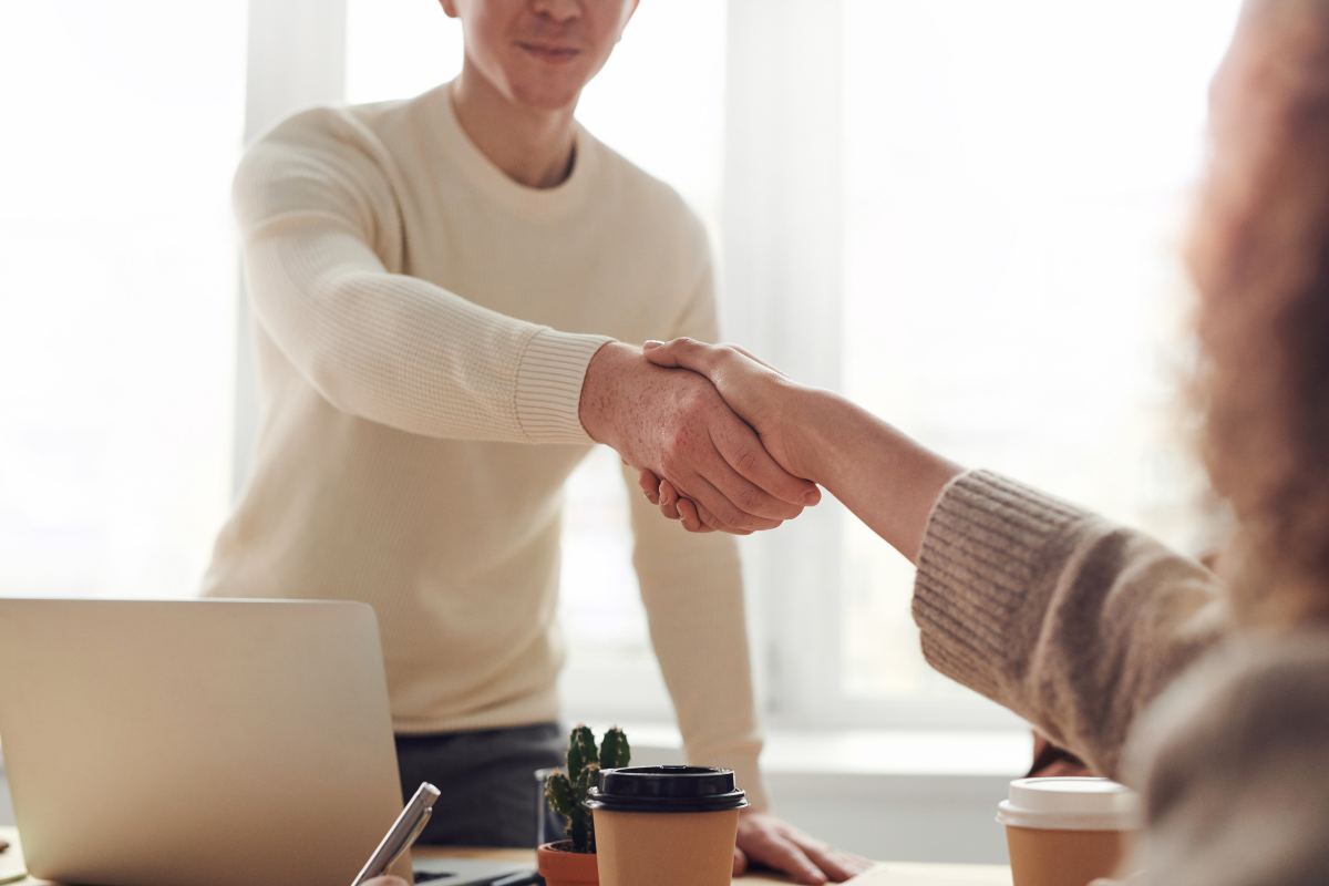 Building Better Deals: two business people shaking hands